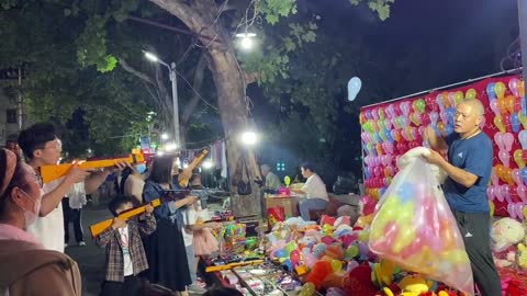 The handsome little brother of the street stall night market