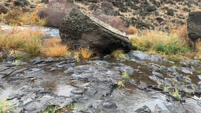 Central Oregon – Steelhead Falls – Crossing Slippery Rocks to the Shoreline – 4K