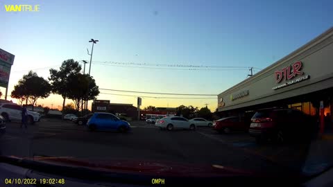 Fiat almost rear ends vehicle backing out of parking space