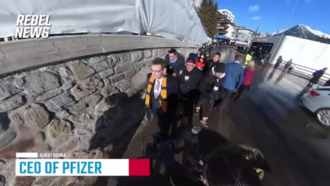 Pfizer C.E.O runs ways on the street in Davos today after question on Vaccine Failure