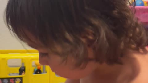 Evelyn singing in a mic