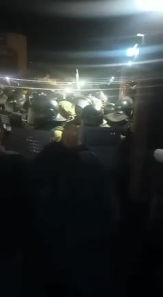 In Aktau, the crowd chants to the inactive (awaiting orders) security officials: "Well done."