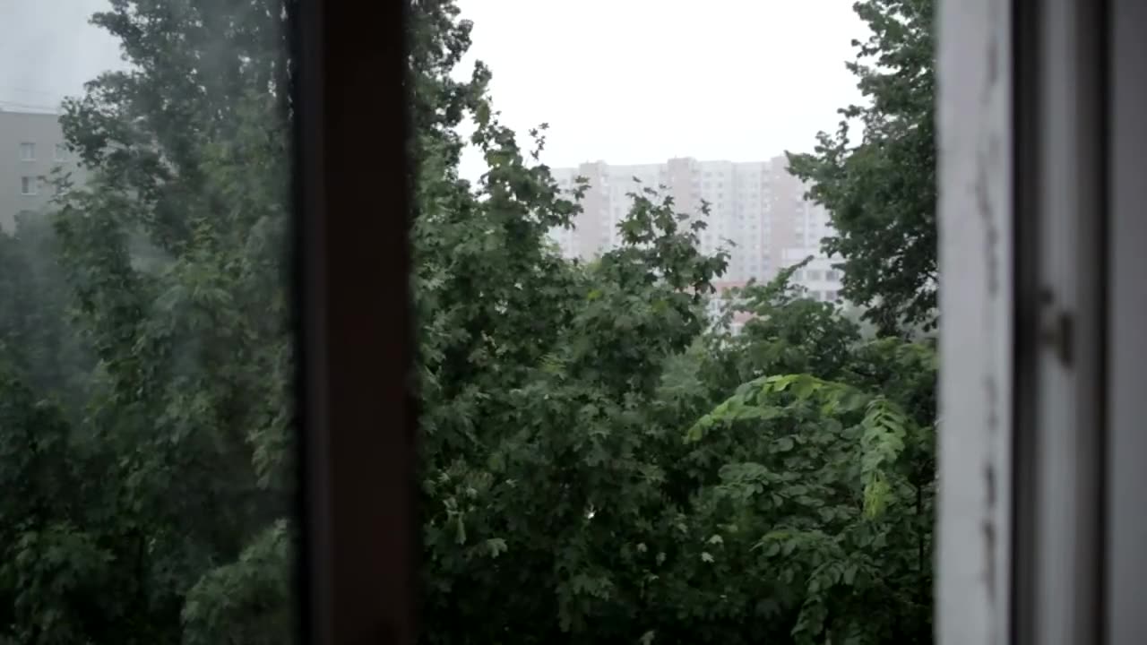 heavy rain from an open window