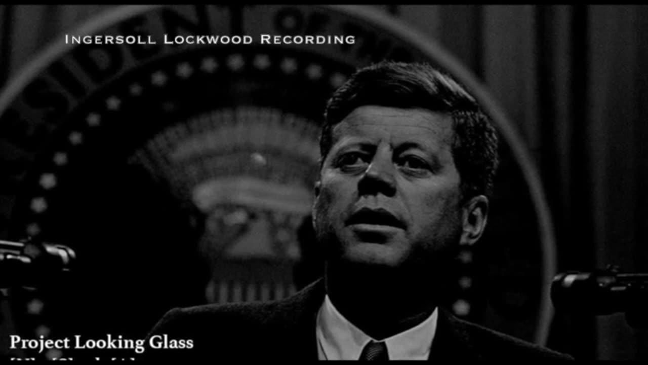 Great awaking JFK looking glass