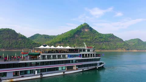 A ship surrounded by mountains