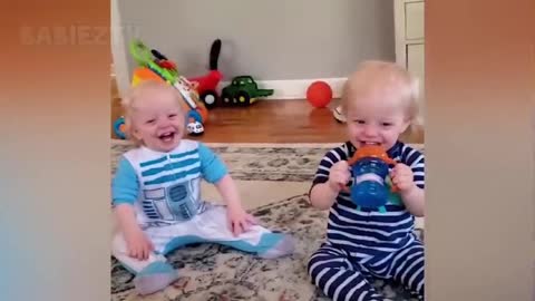 cute little twin entertain each-other