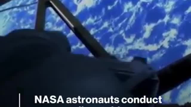 NASA astronauts conduct spacewalk outside the International Space Station