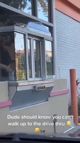 Raccoon Gets A Doughnut From Dunkin Drive Thru
