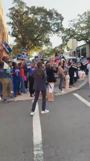 Demonstrators gather outside Walker-Warnock debate in Savannah, GA