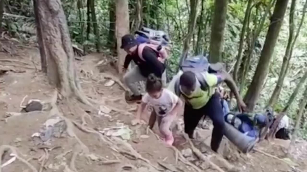 Migrants cross the Darien Gap in Panama on their way to the US-Mexico border.