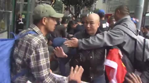 Fight breaks out between separate Chinese factions outside Hyatt Regency hotel, San Francisco.