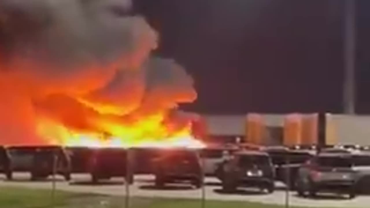 Rivian electric car plant is on fire right now , in Normal IL USA...