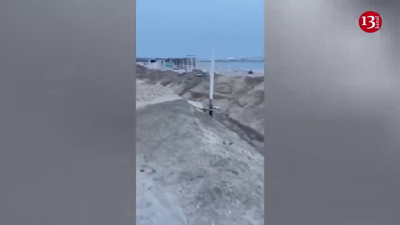 New footage from Crimea - Russians preparing to defend themselves by digging trenches on a sea coast