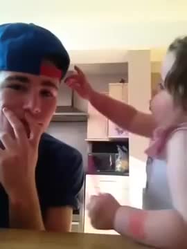 Boy scares little girl