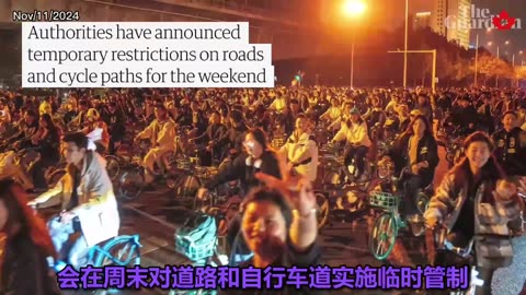 Thousands of Chinese students take part in night cycle ride to Kaifeng in search of soup dumplings