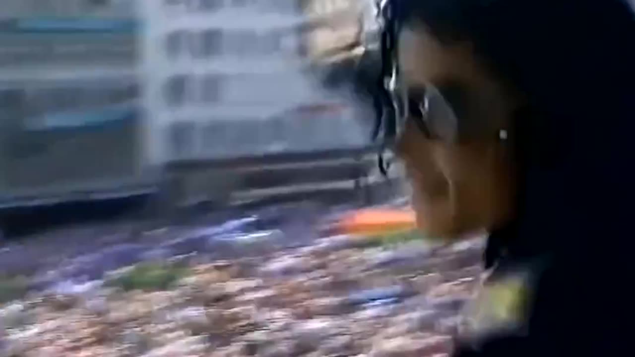 All these people gathered just to see Michael Jackson wave from his hotel