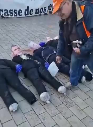 Life Size Characters of France’s Prime Minister Macron and his team are burned