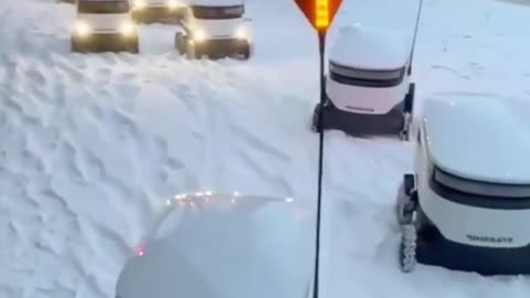 Snow delivery robot traffic jam in Estonia