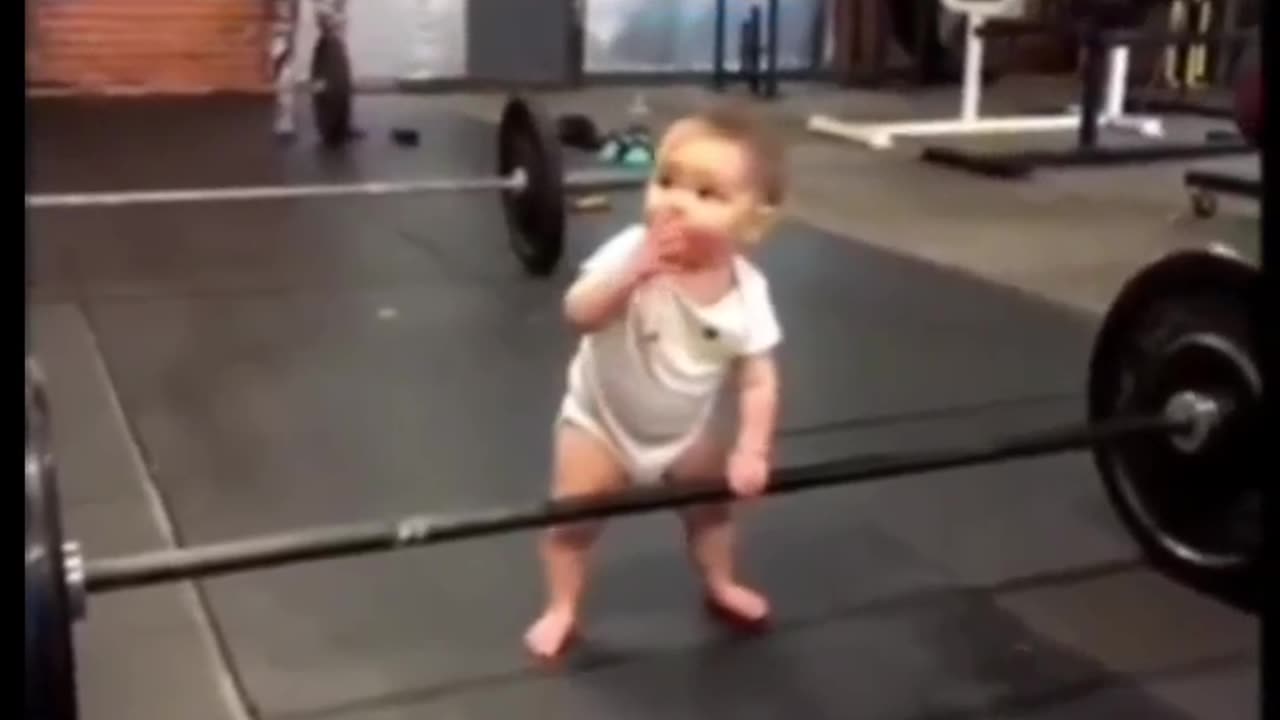 Tiny Tot's Tremendous Training: Baby Takes on the Gym