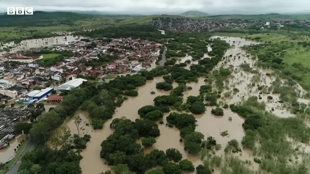 Dams burst in Brazil as deadly flooding continues - BBC News