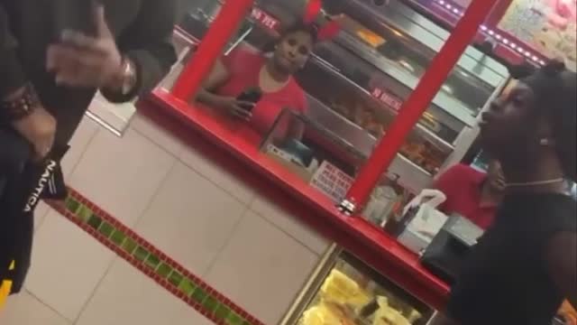 Guy and his wife coming from church get harassed while trying to order food