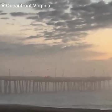 🚨#WATCH: As Dramatic Footage Captures Vehicle Driving Through and Plunging Off Fishing Pier