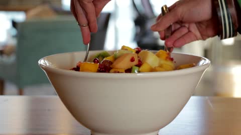 Preparing fruit salad