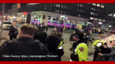 Dozens of angry protestors swarm Trudeau in Hamilton