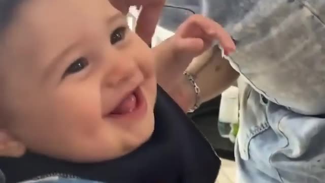 Baby haircut and smile