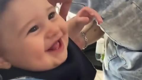 Baby haircut and smile