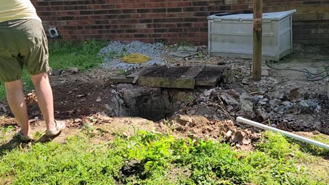 FILLING IN A CISTERN THAT HAD BEEN COVERED FOR 20 YEARS
