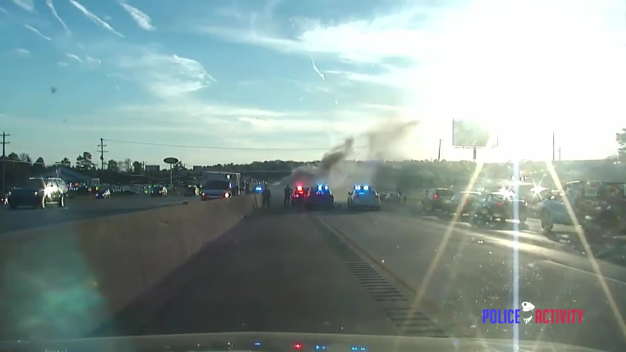 Raw Dashcam Video Shows Cops Rescue Man From Burning Hummer