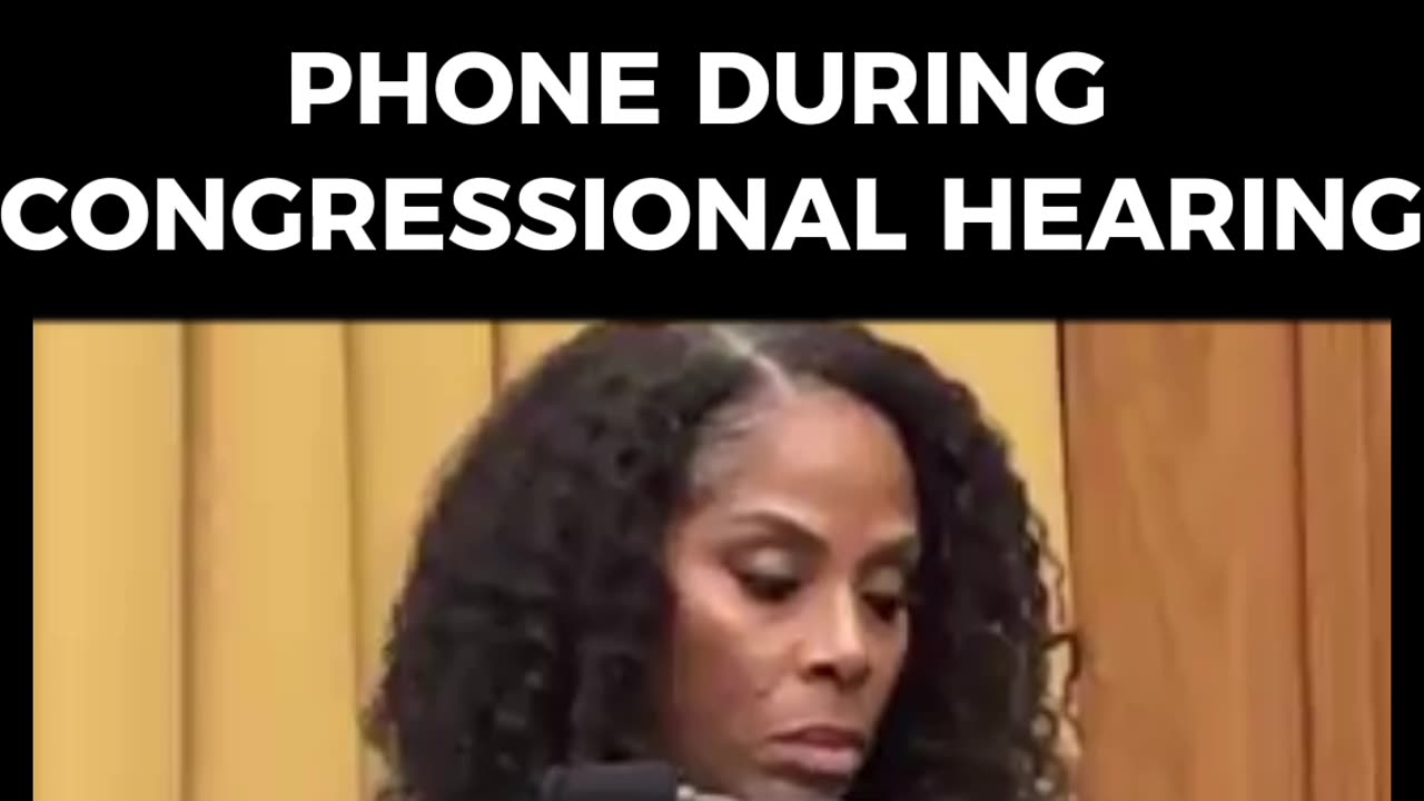 House Democrat appears to be playing Candy Crush During House Hearing...