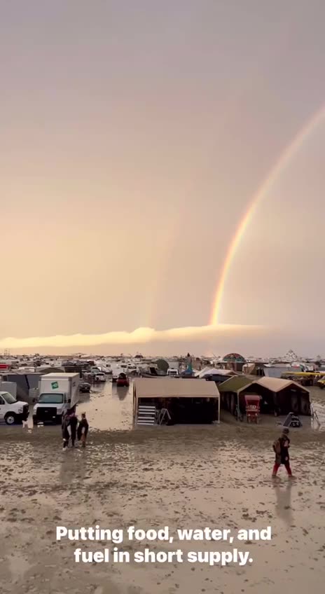 One dead and thousands stuck amid heavy rain and mud at Burning Man festival in Nevada.