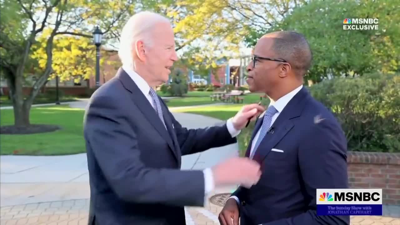 Joe Biden bothering a reporter person