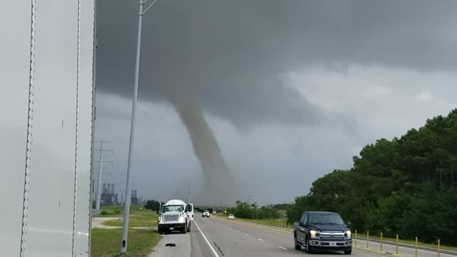 Huge Dust Devil Forms in Refinery