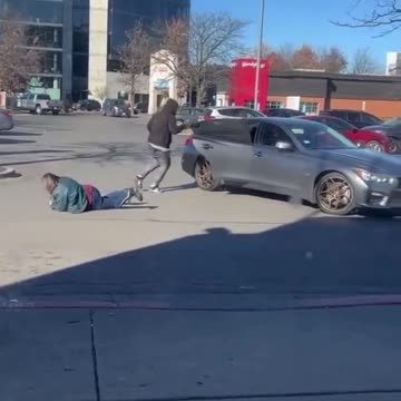 Woman gets robbed in front of a bank in Milwaukee men hide and film