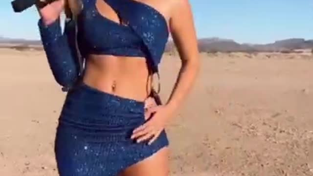 Hot Israeli Girl shoots golden Uzi