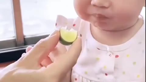 What happened after the little child tasted the lemon