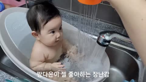 bathing baby on small tub