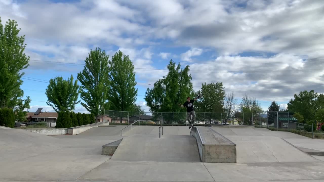 Guy Slips And Falls Down After Finishing Trick While Rollerskating In Skate Park