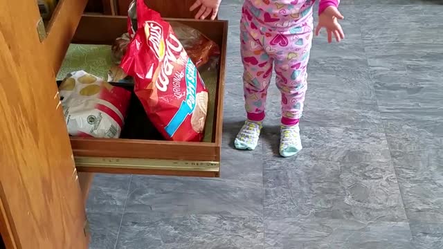 Little Girl gets caught sneaking Chips