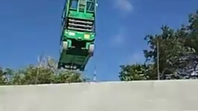 Crane lifting scissor lift