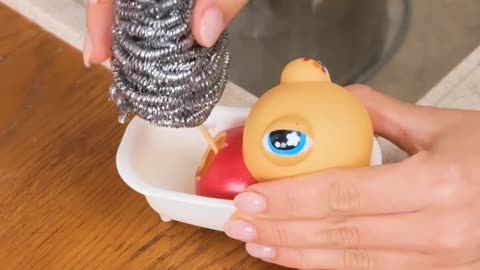 Decorate a Rubbish Pot with a plastic duck doll