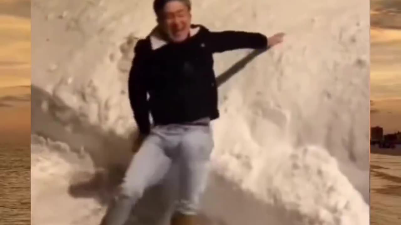 Funny videos that will make your day- a man jumps onto a rock thinking it was a heap of snow😂😂