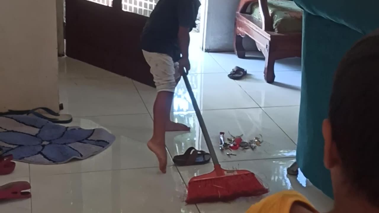 children clean the house