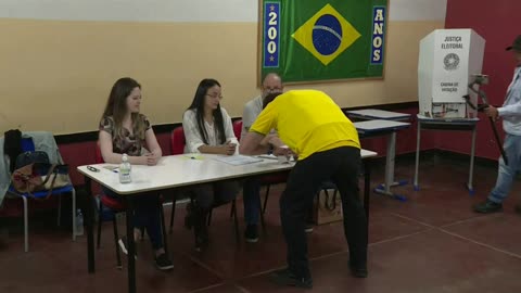 Brazil incumbent Bolsonaro votes in presidential election _ AFP