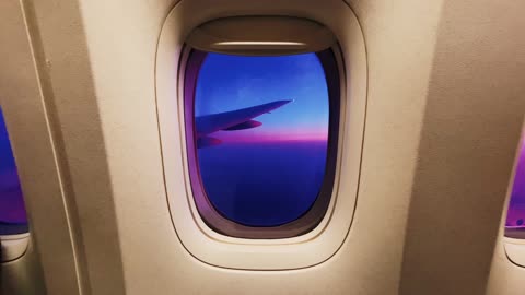 view of sunset airplan window