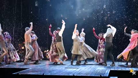 Bernard Curry dances with other cast in A Christmas Carol Australia