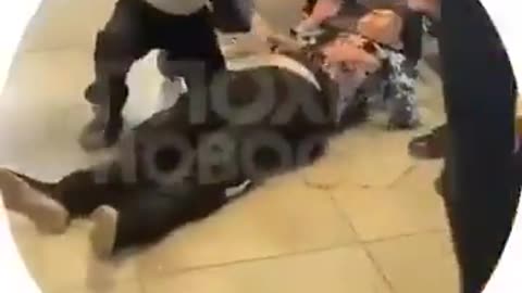 Karen gets knocked out for grabbing neck of someone else's child